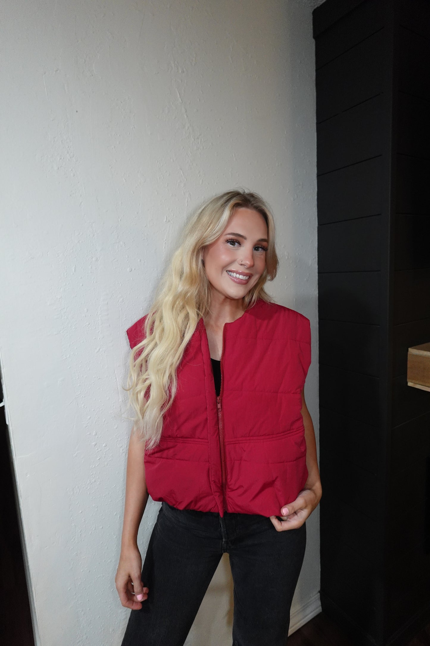 red puffer vest