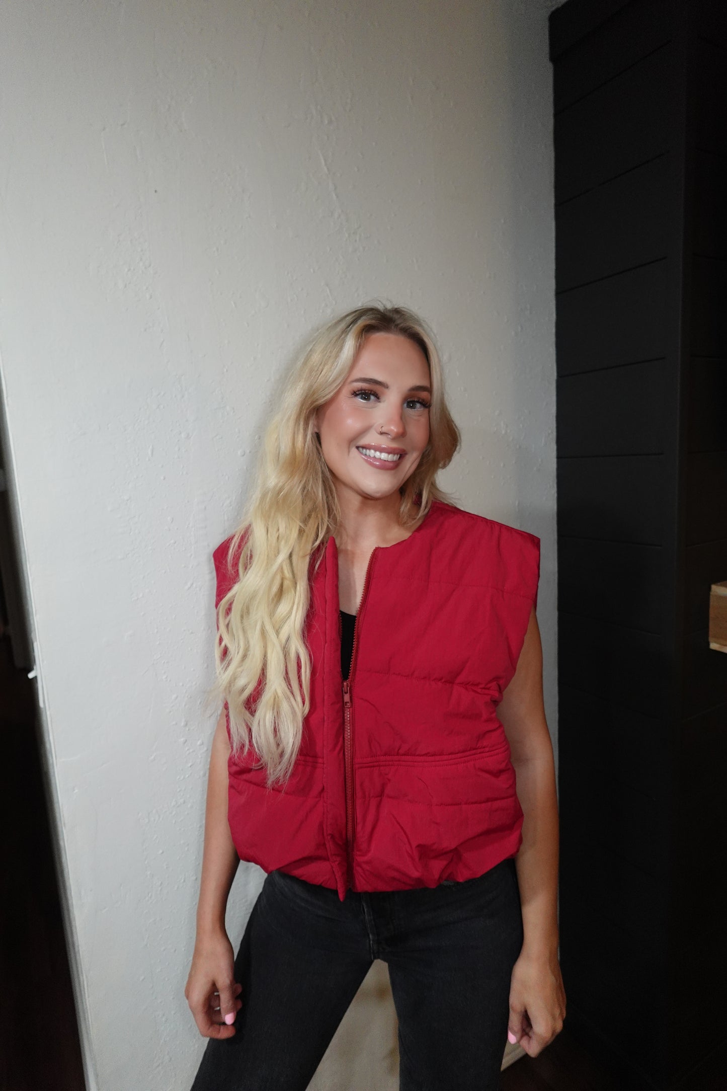 red puffer vest
