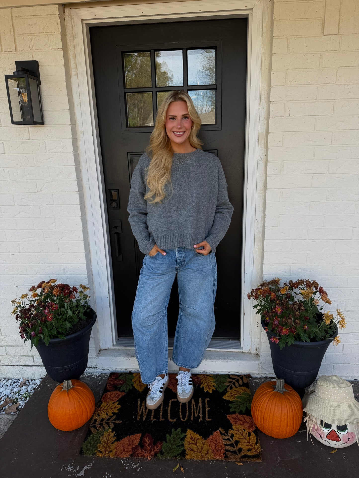 charcoal grey sweater with bow detail
