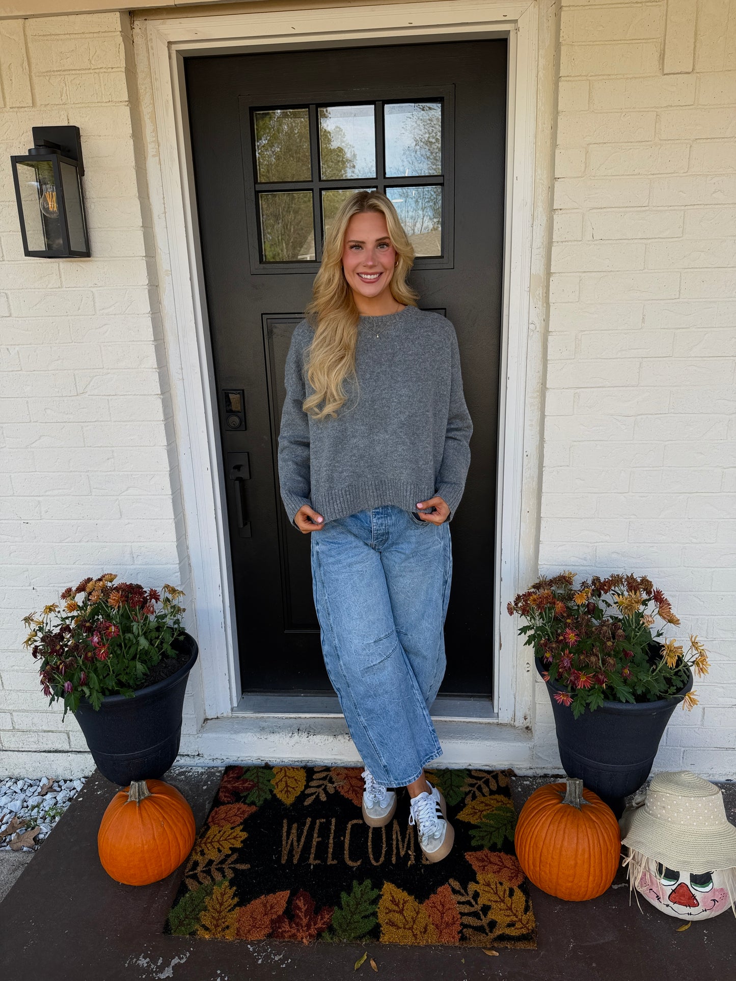 charcoal grey sweater with bow detail
