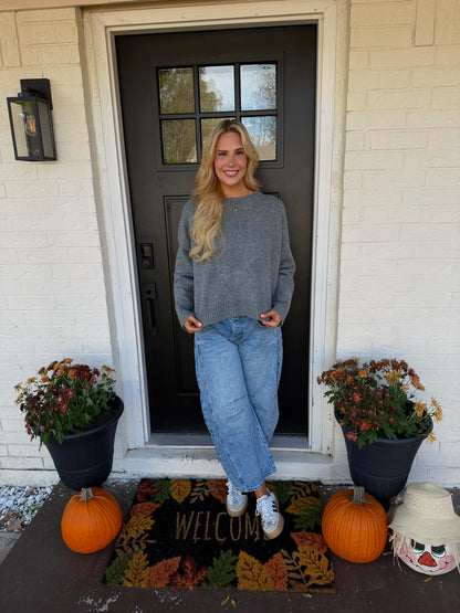 charcoal grey sweater with bow detail