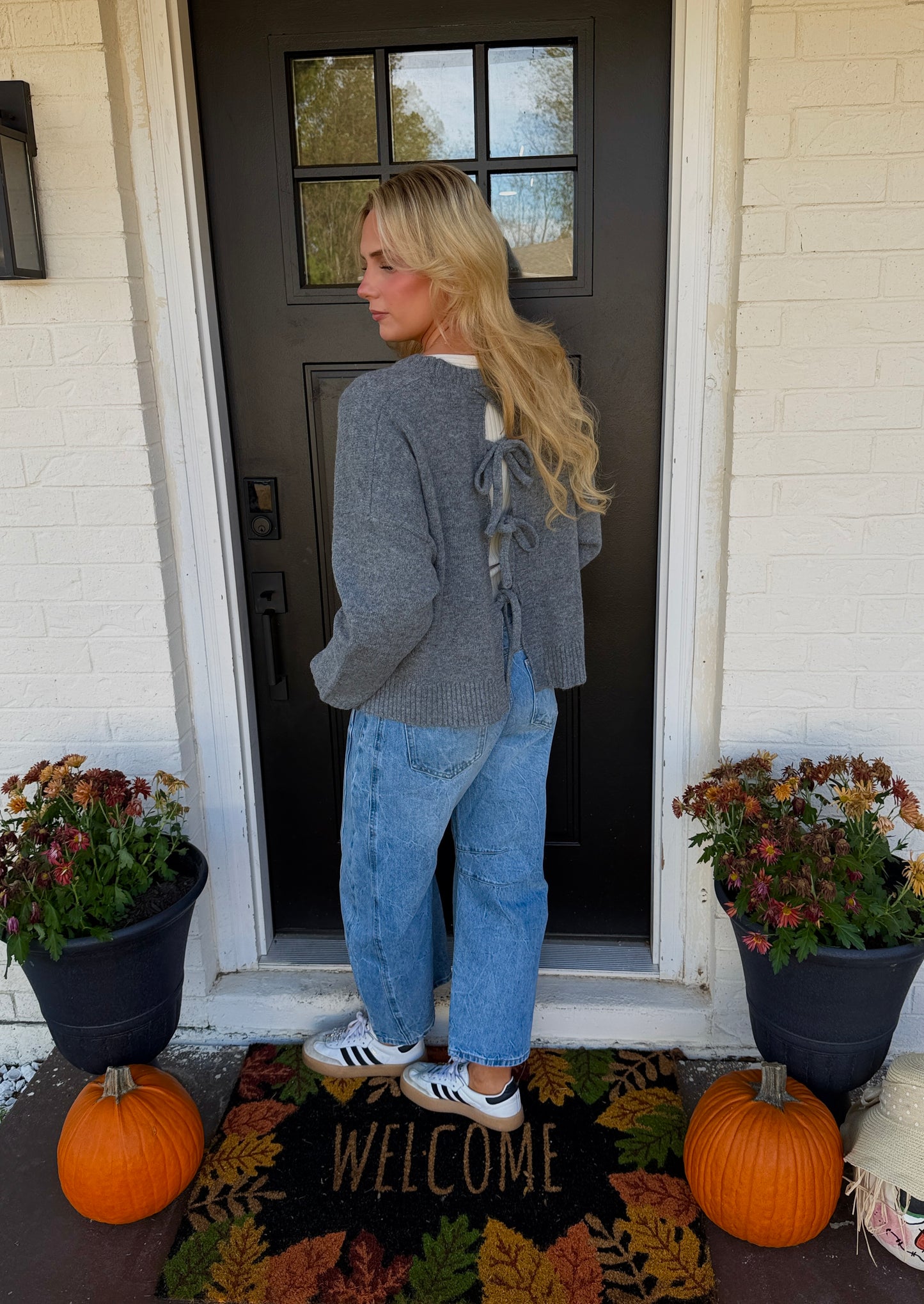 charcoal grey sweater with bow detail