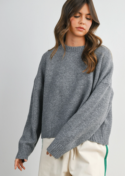 charcoal grey sweater with bow detail